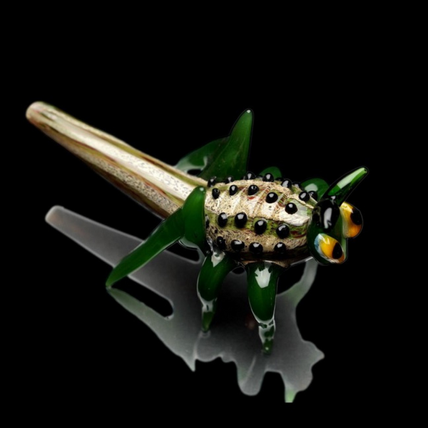 Cricket Glass Hand Pipe, a unique and visually stunning piece for your smoking collection. Crafted with intricate detail and designed for both function and display, this hand pipe is sure to impress.