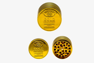Gold Coin Grinder - 3 piece (2.2") (55mm) Experience the luxury of grinding with the Gold Coin Grinder – a 3-piece masterpiece that combines elegance and functionality. With a Heavy Duty build and a comfortable 2.2-inch (55mm) size, this grinder is your golden ticket to a seamless herb grinding experience.
