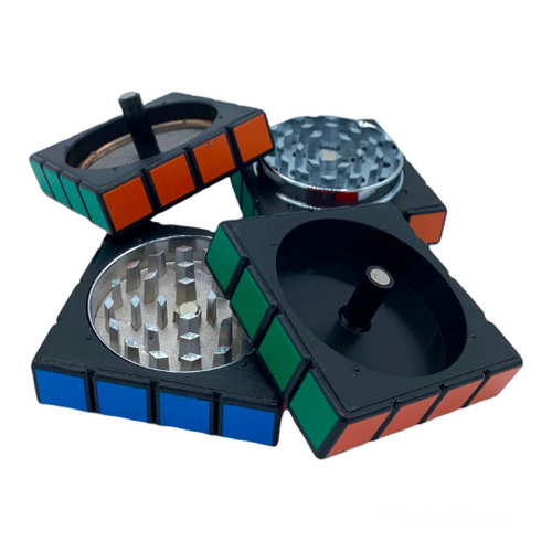 Rubik's Cube 2.3 inch Grinder Zinc Alloy Large Grinder Turn your herb grinding into a puzzle-solving experience with the Rubik's Cube Grinder. This 4-piece large grinder features a Heavy Duty build, a compact 2.2-inch (50mm) size, and the iconic Rubik's Cube design for a fun and functional grinding experience.
