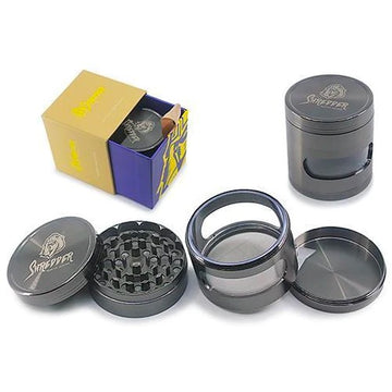 Shredder - Stealth Grinder (2.5")(63mm) Unleash the power of precision with the Shredder - Stealth Grinder. This 4-piece marvel features a Heavy Duty build, a spacious 63mm size, and a stealthy design that adds an element of mystery to your herb preparation ritual.