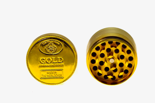 Gold Coin Grinder - 3 piece (2.2") (55mm) Experience the luxury of grinding with the Gold Coin Grinder – a 3-piece masterpiece that combines elegance and functionality. With a Heavy Duty build and a comfortable 2.2-inch (55mm) size, this grinder is your golden ticket to a seamless herb grinding experience.