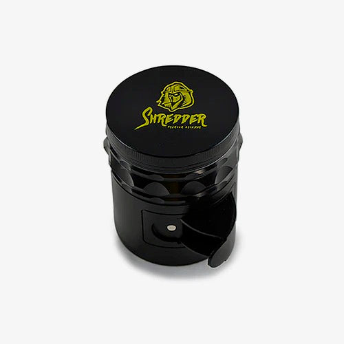 Shredder - Gear Side Gate Grinder (2")(50mm) Unleash precision and innovation with the Shredder - Gear Side Gate Grinder. This 4-piece marvel, featuring a robust Heavy Duty build and a compact 50mm size with a gear side gate, adds a touch of mechanical elegance to your herb preparation ritual.