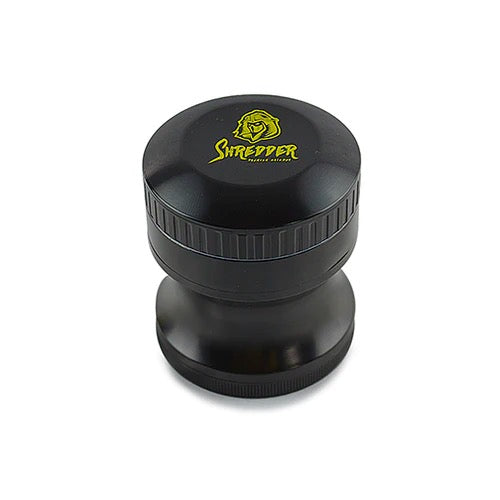 Shredder - Curvy Grinder (2")(50mm) Embrace elegance and precision with the Shredder - Curvy Grinder. This 4-piece masterpiece features a Heavy Duty build, a compact 50mm size, and a curvy design that adds a touch of sophistication to your herb preparation ritual.