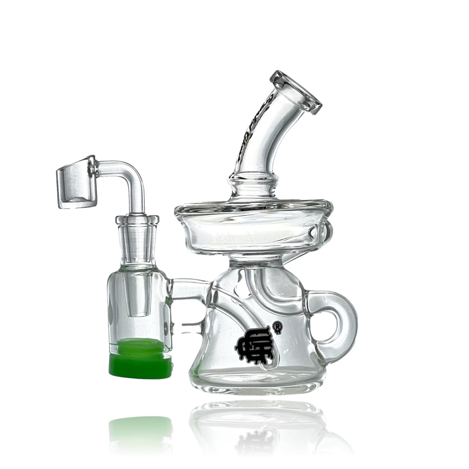Introducing the Crystal Glass Recycler Dab Rig with Reclaimer – Elevate Your Concentrate Experience  Immerse yourself in the world of premium concentrate consumption with our Crystal Glass Recycler Dab Rig, featuring an innovative reclaimer for an unmatched and efficient dabbing experience. Crafted with precision and style, this dab rig is designed to elevate your concentrate sessions to a new level of satisfaction.
