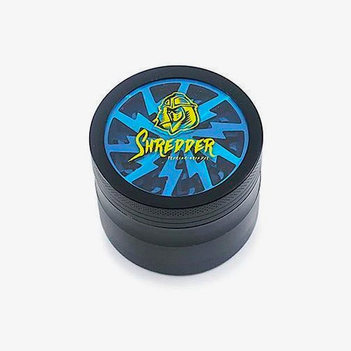 Shredder - Lightning Grinder (2.5")(63mm) Experience the speed of precision with the Shredder - Lightning Grinder. This 4-piece powerhouse features a Heavy Duty build, a spacious 63mm size, and a lightning design that adds a striking element to your herb preparation ritual.