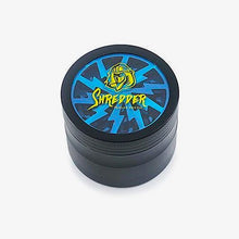 Load image into Gallery viewer, Shredder - Lightning Grinder (2.5&quot;)(63mm) Experience the speed of precision with the Shredder - Lightning Grinder. This 4-piece powerhouse features a Heavy Duty build, a spacious 63mm size, and a lightning design that adds a striking element to your herb preparation ritual.
