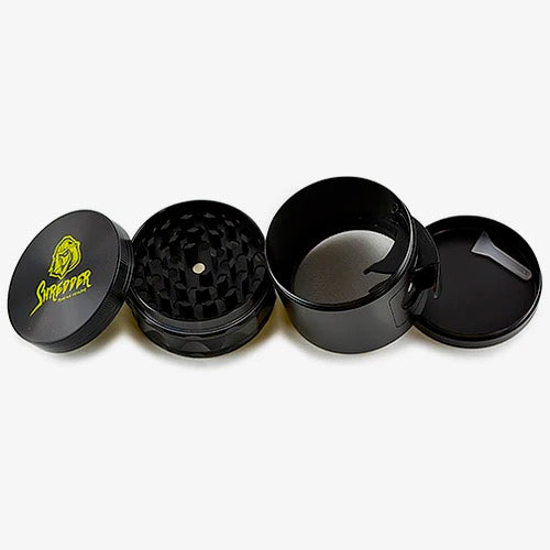 Shredder - Gear Side Gate Grinder (2")(50mm) Unleash precision and innovation with the Shredder - Gear Side Gate Grinder. This 4-piece marvel, featuring a robust Heavy Duty build and a compact 50mm size with a gear side gate, adds a touch of mechanical elegance to your herb preparation ritual.