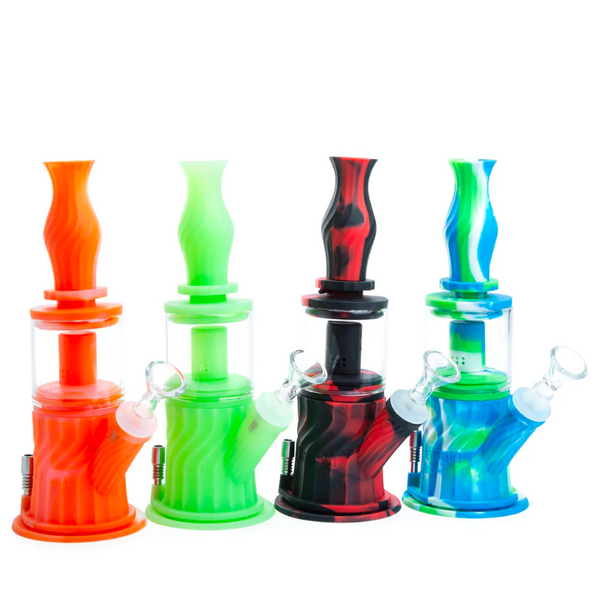 Waxmaid Silicone Four-in-One  BONG/DAB RIG/NECTAR COLLECTOR/BUBBLER  Introducing the Waxmaid Silicone Four-in-One, the ultimate versatile smoking device that combines a bong, dab rig, nectar collector, and bubbler all in one. Crafted by Waxmaid, known for their innovative silicone smoking products, this multifunctional piece offers unparalleled convenience and flexibility for smokers.